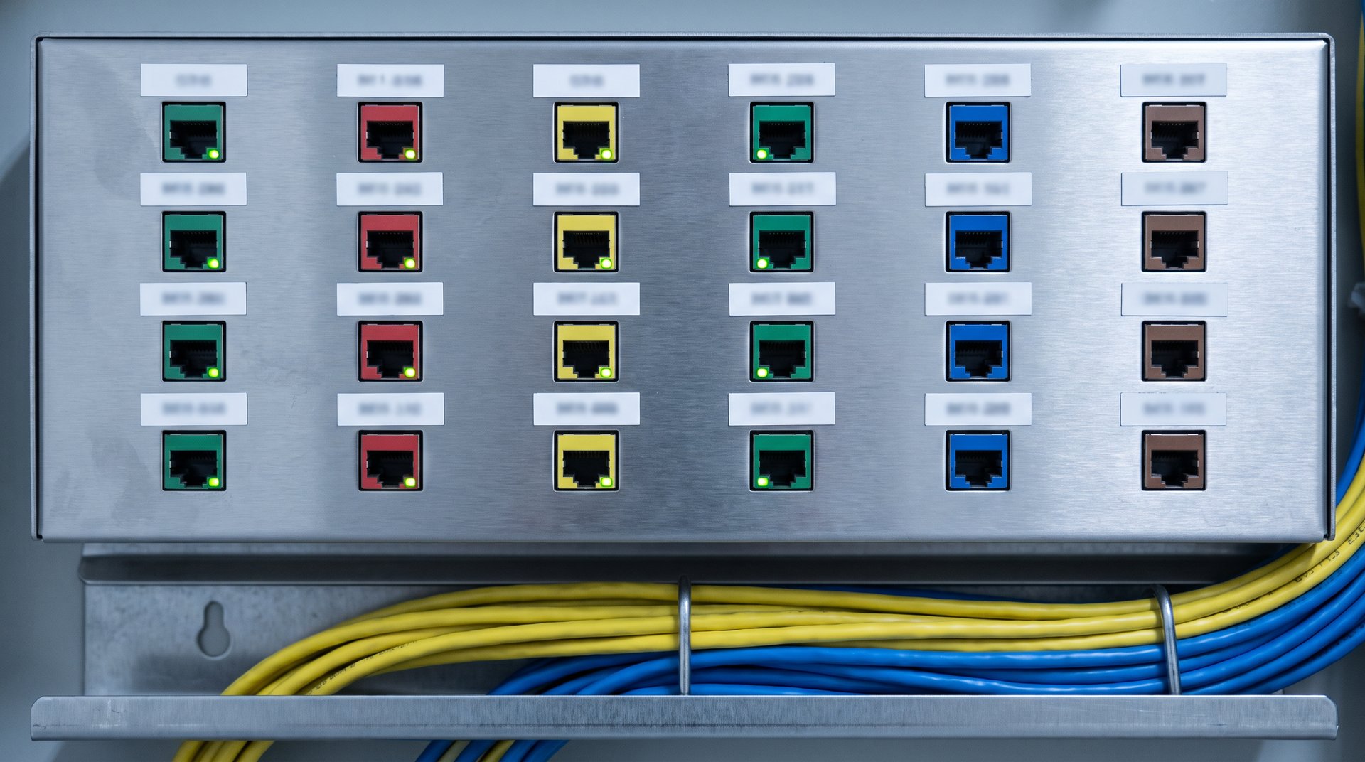 Industrial network patch panel with color-coded ethernet ports and neat cable management